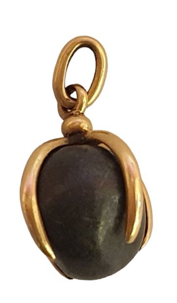 Pendentif en or jaune 18 K (750/oo) à quatre...