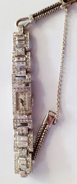 Montre bracelet de dame en or blanc 18 K...