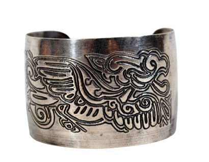 BRACELET MANCHETTE en métal argenté à décor...
