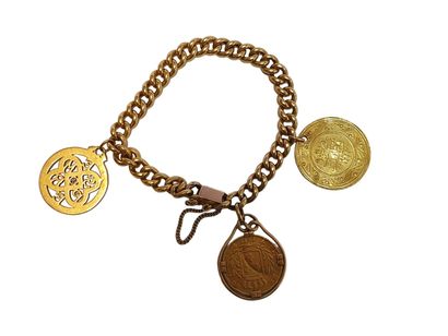 Bracelet gourmette en or jaune 18 K (750/oo)...