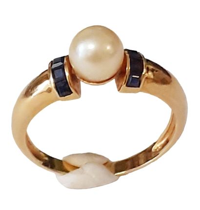 BAGUE en or jaune 18K (750/1000e) sertie...