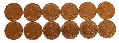 Réunion de 12 pièces de 20 Francs en or Coq...