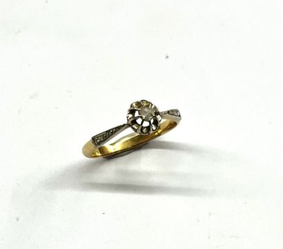 BAGUE en or gris et jaune 18K (750/1000e)...
