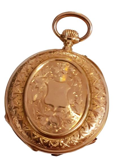 MONTRE DE COL en or jaune 18 K (750/oo),...