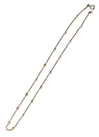 COLLIER en or jaune 18K (750/1000e) composé...