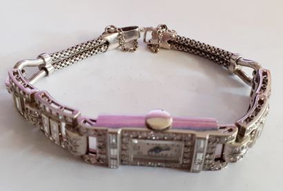 Montre bracelet de dame en or blanc 18 K...