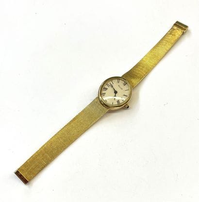 SUJA Genève 

Montre de dame en or jaune...