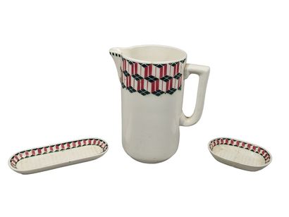 SAINT AMAND
Garniture de toilette en faïence...