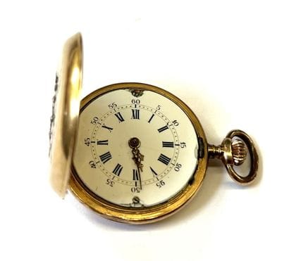 GENEVE
Montre savonnette de col en or jaune...