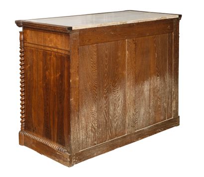 COMMODE en palissandre, la façade ouvrant...