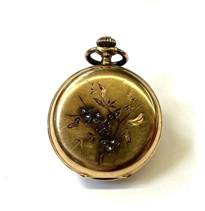 GENEVE
Montre savonnette de col en or jaune...