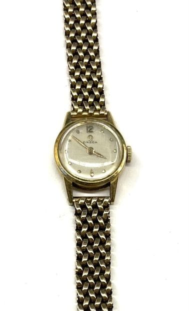 OMEGA
Montre de dame en or 18 K (750/oo)...