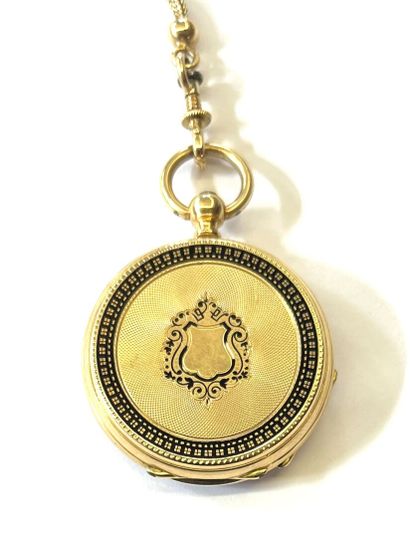 MONTRE DE COL en or jaune 18k (750/°°), dos...