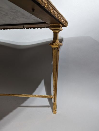 Maison JANSEN 
Table basse reposant sur un...