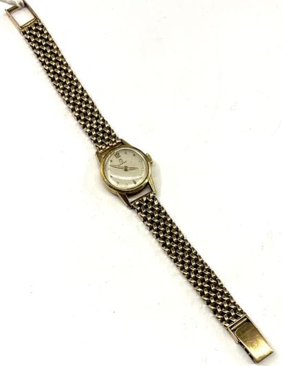 OMEGA
Montre de dame en or 18 K (750/oo)...