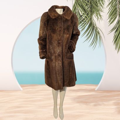 HERMES PARIS
Long manteau de dame en fourrure...