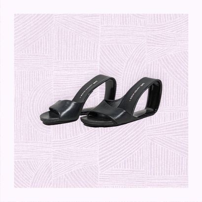 UNITED NUDE
Paire de sandales en cuir noir...