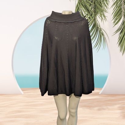 ZUCCHERO MILANO
Poncho en laine noir avec...