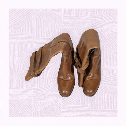SARTORE
Paire de bottes à haut talon en cuir...