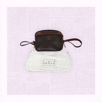 GUCCI
Sac à main bandoulière en cuir et tissu...