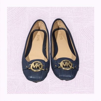 MICHAEL KORS
Paire de ballerines en cuir...