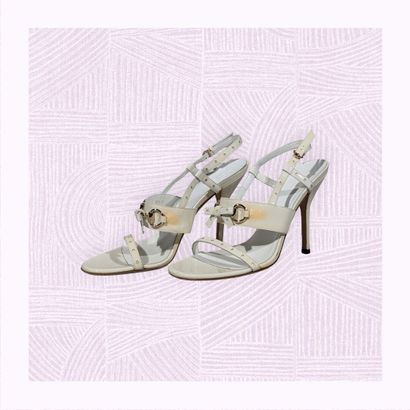 GUCCI
Paire de sandales sur talon aiguille...