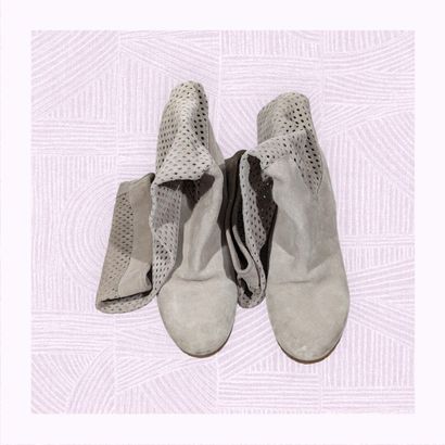 MARC CAIN
Paire de bottes sur haut talon...