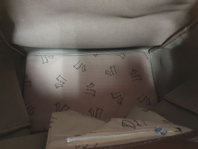 FAVO
Sac de voyage façon valise en cuir grainé...