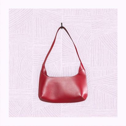 LANCEL
Petit sac à main en cuir lisse rouge...