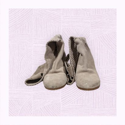 MARC CAIN
Paire de bottes sur haut talon...