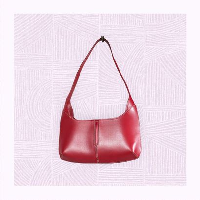 LANCEL
Petit sac à main en cuir lisse rouge...