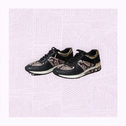 MICHAEL KORS
Paire de sneakers en cuir noir...