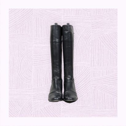 CHARLES KAMMER
Paire de bottes sur léger...
