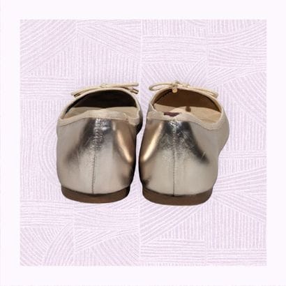 COSMOPARIS
Paire de ballerines en cuir verni...