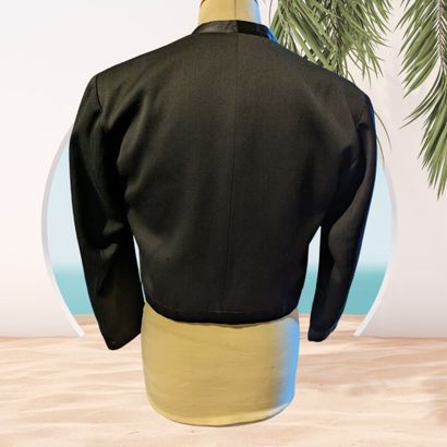 KENZO, Paris. 
Veste boléro brodée en laine...
