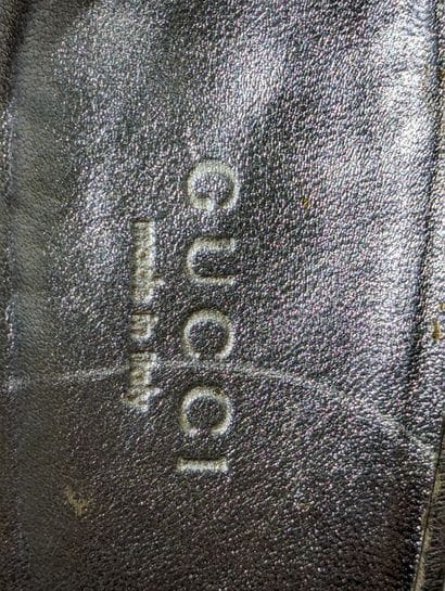 GUCCI
Paire de sandales sur talon compensé...