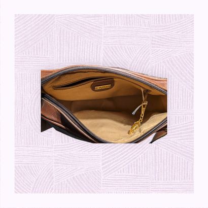GUCCI
Sac à main bandoulière en cuir et tissu...