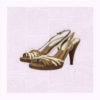 PRADA
Paire de sandales en cuir camel et...
