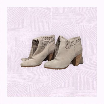 MARC CAIN
Paire de bottes sur haut talon...