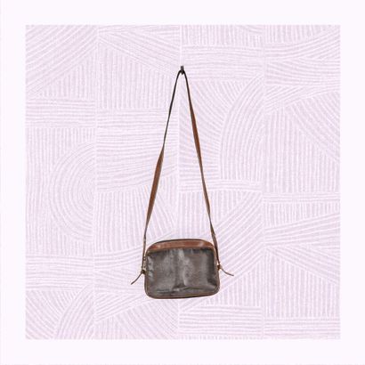 GUCCI
Sac à main bandoulière en cuir et tissu...