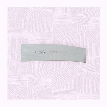 LIU JO
Importante ceinture en cuir blanc...