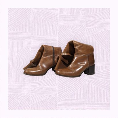 SARTORE
Paire de bottes à haut talon en cuir...