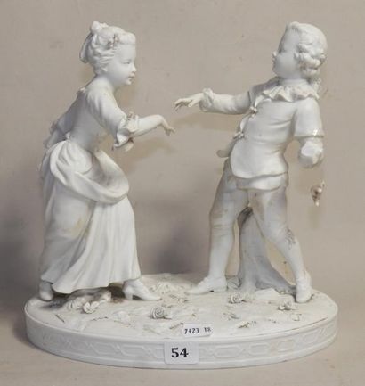 DELATOURE
Groupe en biscuit figurant un couple...