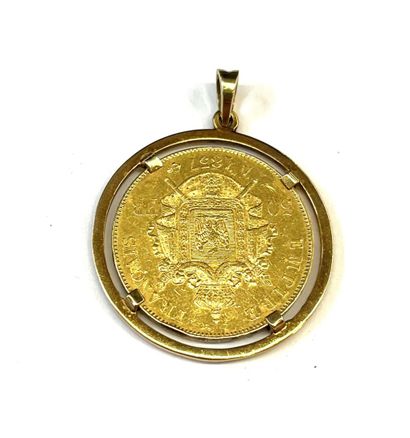 PENDENTIF rond en or jaune 18K (750/°°) centré...