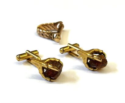 Paire de boutons de manchette en métal doré...