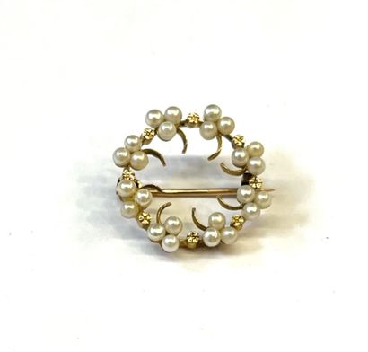 BROCHE en or rose 18k (750/°°) sertie de...