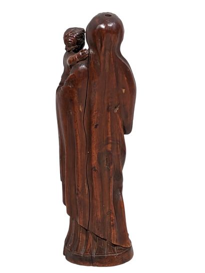Vierge à l'Enfant en buis sculpté 
Époque...