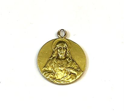 MEDAILLE DE BAPTEME en or jaune figurant...