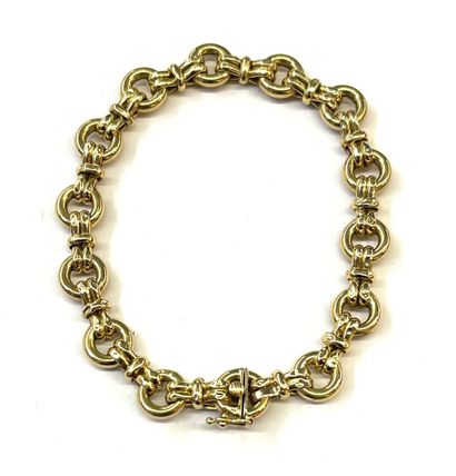 Bracelet en or jaune 18 K (750/oo) à mailles...