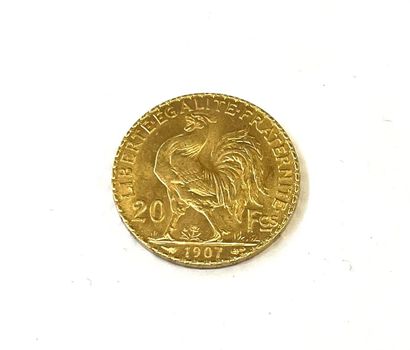 Une pièce de 20 FRANCS 1907 au cop de chaplain...